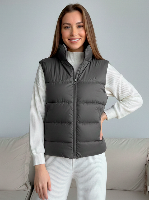 Жіночий жилет на синтепоні колір Сірий Жіночий жилет на синтепоні колір Сірий